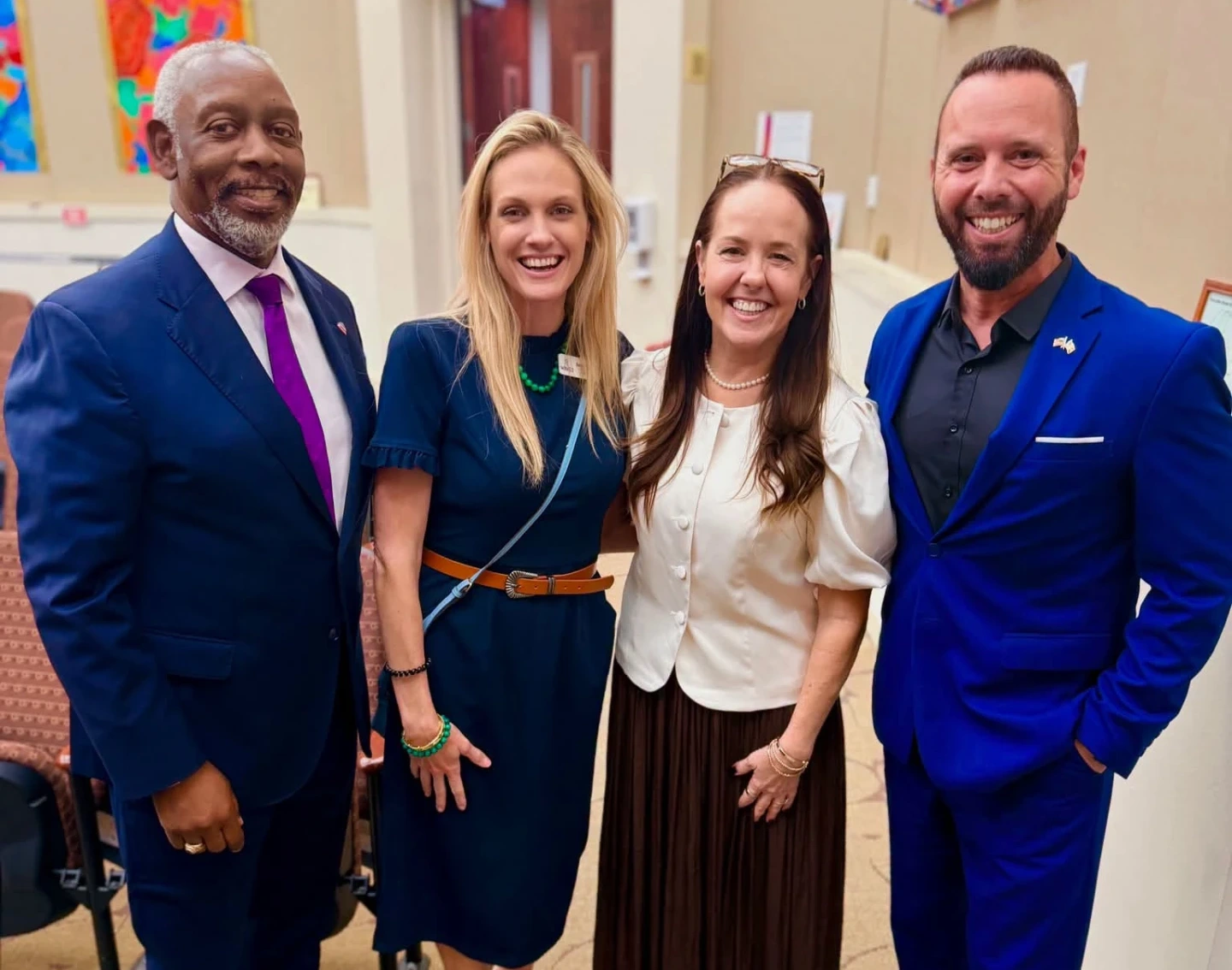 Jerry Demings, Sara Meyer, Nicole Wilson, and Austin Arthur celebrating the museum funding milestone.